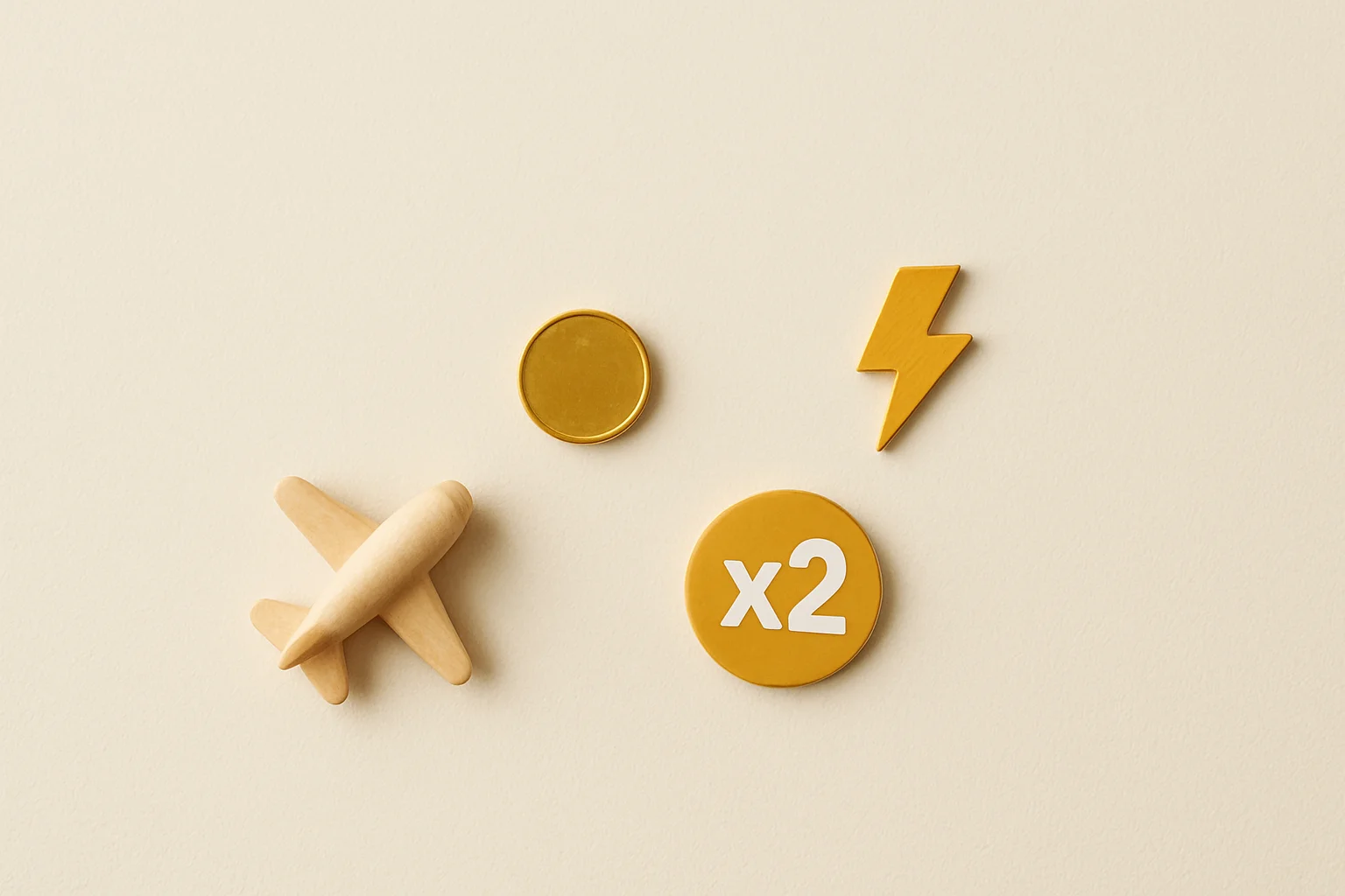Overhead flat lay with airplane figurine, gold coin, lightning token, multiplier badge